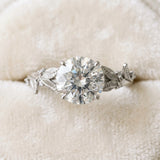 Silver Round Cut Diamond Solitaire Ring with Leaf Motif Band and Four-Prong Setting_99