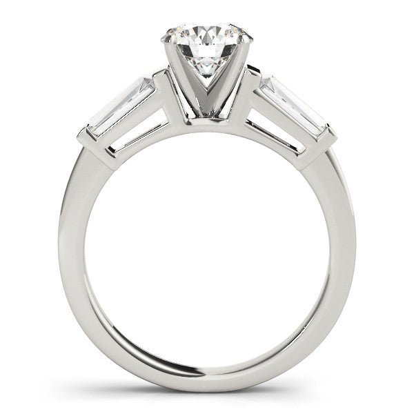 Silver Round Cut Diamond Solitaire Ring with Tapered Baguette Accents and Four-Prong Setting