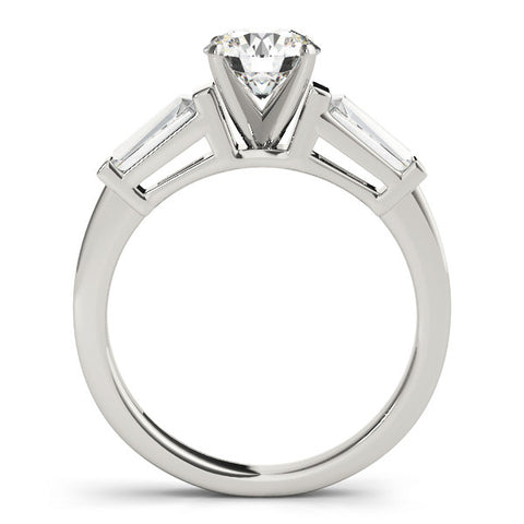 Silver Round Cut Diamond Solitaire Ring with Tapered Baguette Accents and Four-Prong Setting