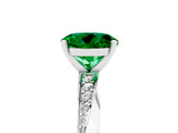 Silver Round Cut Emerald Engagement Ring with Side Stone Accents and Four-Prong Setting_17