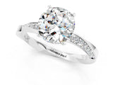 Silver Round Cut Moissanite Engagement Ring with Side Stone Accents and Four-Prong Setting_25
