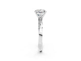Silver Round Cut Moissanite Engagement Ring with Side Stone Accents and Four-Prong Setting_26