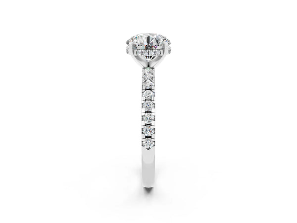 Silver Round Cut Moissanite Solitaire Ring with Round Pavé Band and Four-Prong Setting