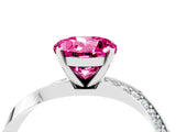 Silver Round Cut Pink Sapphire Engagement Ring with Side Stone Accents and Four-Prong Setting_16