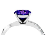 Silver Round Cut Tanzanite Engagement Ring with Side Stone Accents and Four-Prong Setting_16