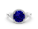 Silver Round Cut Tanzanite Halo Ring with Tapered Band and Four-Prong Setting_25