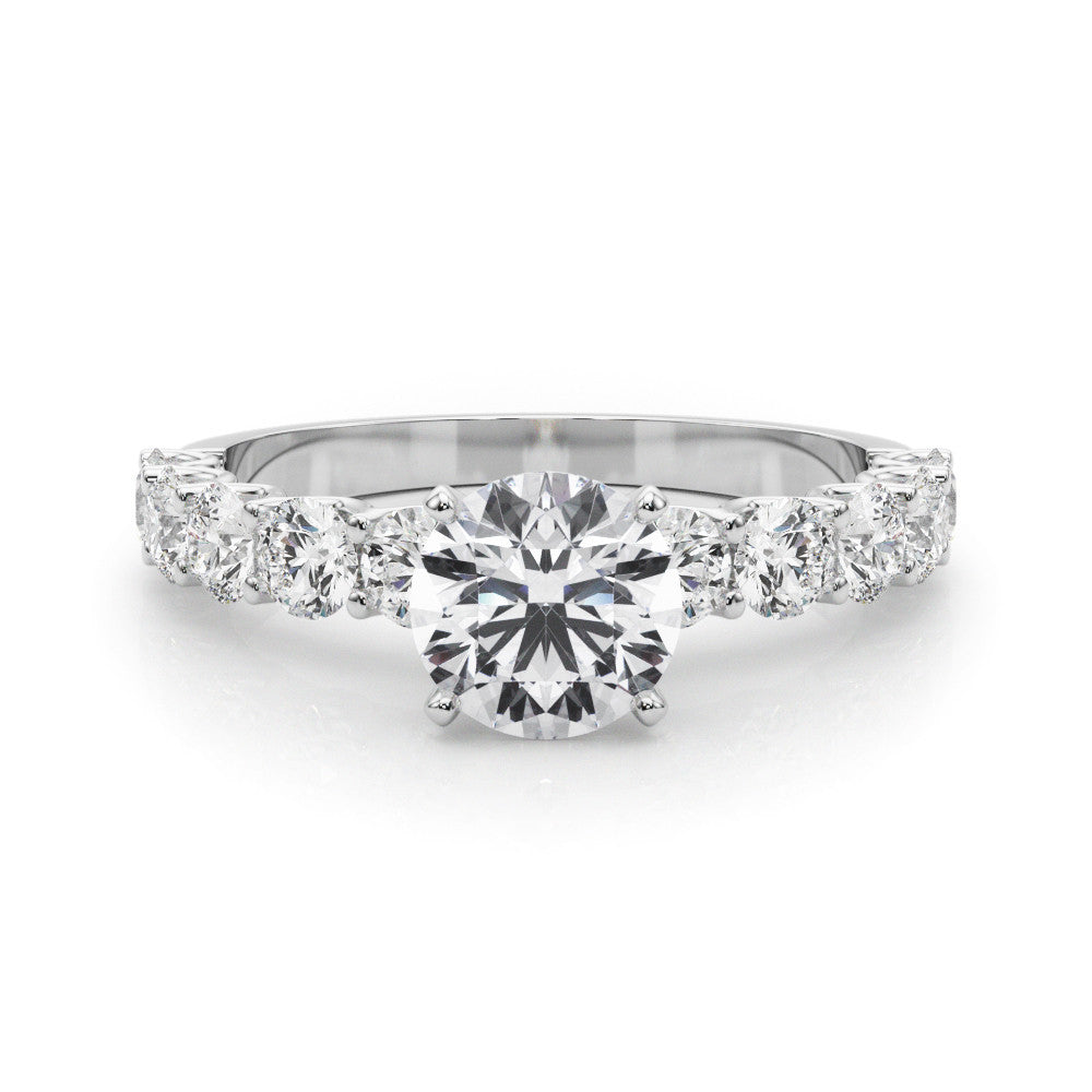Silver Round Diamond Prong Setting with Side Stones on a Pave Band
