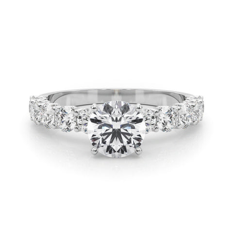 Silver Round Diamond Prong Setting with Side Stones on a Pave Band
