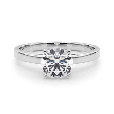Silver Round Solitaire Diamond Engagement Ring with Four-Prong Setting on a Classic Band