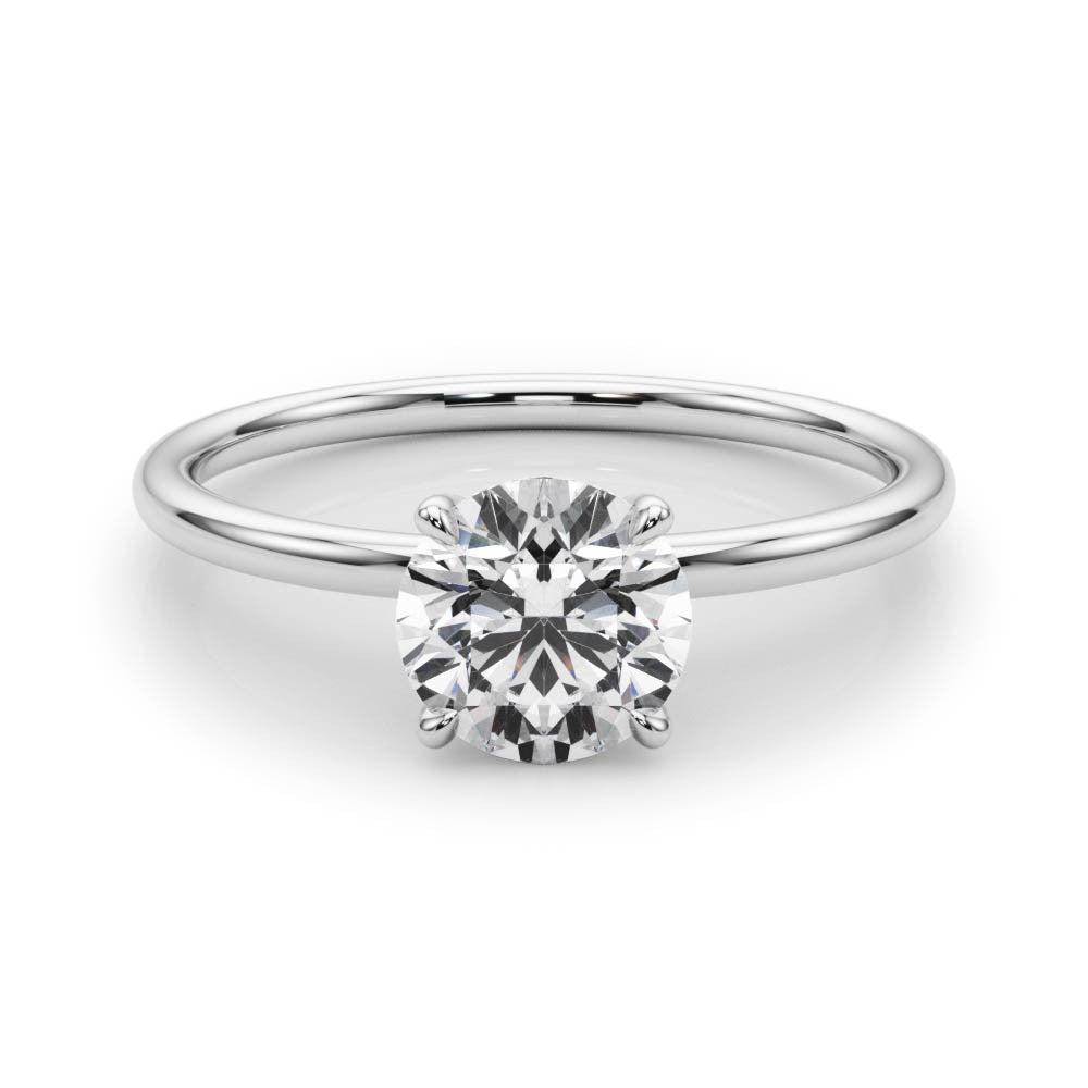 Silver Round Solitaire Diamond Ring with 4-Prong Setting on a Classic Band