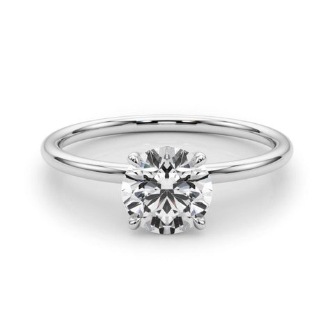 Silver Round Solitaire Diamond Ring with 4-Prong Setting on a Classic Band