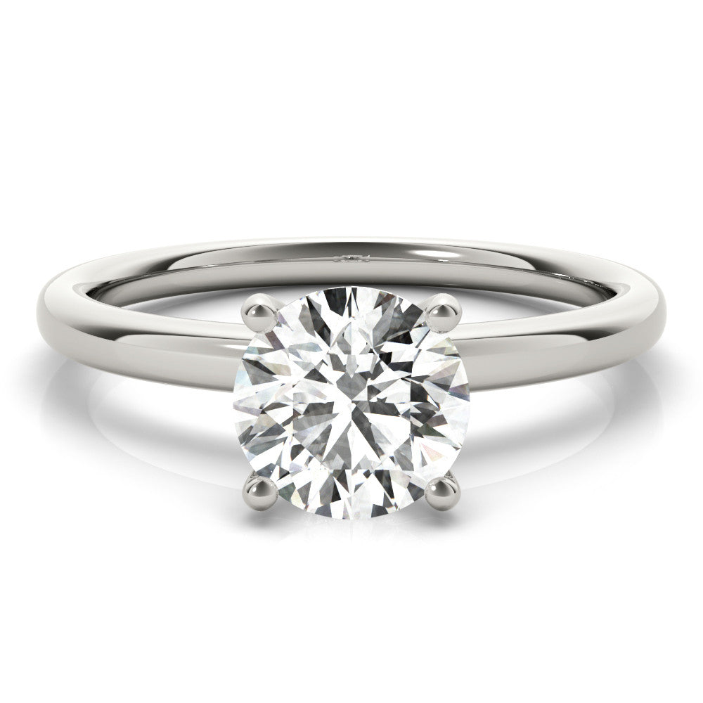 Silver Round Solitaire Diamond Ring with Four-Prong Setting and Classic Band