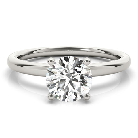 Silver Round Solitaire Diamond Ring with Four-Prong Setting and Classic Band