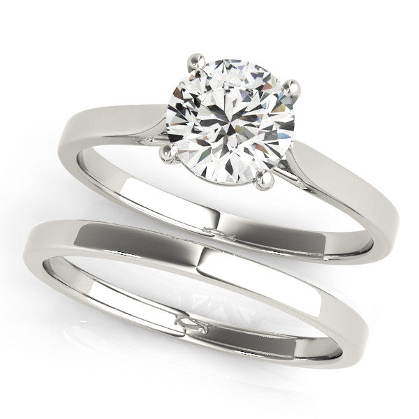 Silver Round Solitaire Diamond Ring with Four-Prong Setting and Tapered Band