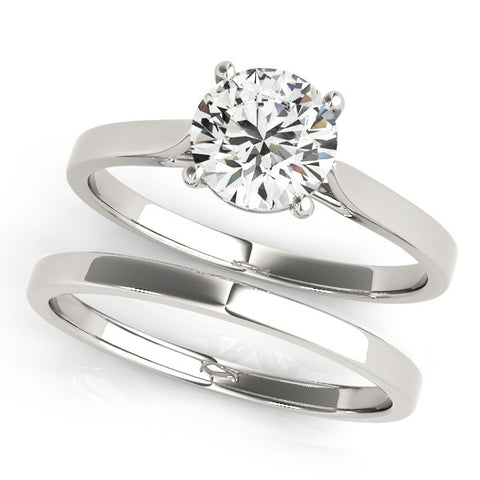 Silver Round Solitaire Diamond Ring with Four-Prong Setting and Tapered Band
