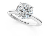 Silver Round Solitaire Diamond Ring with Six-Prong Setting on a Classic Band 1