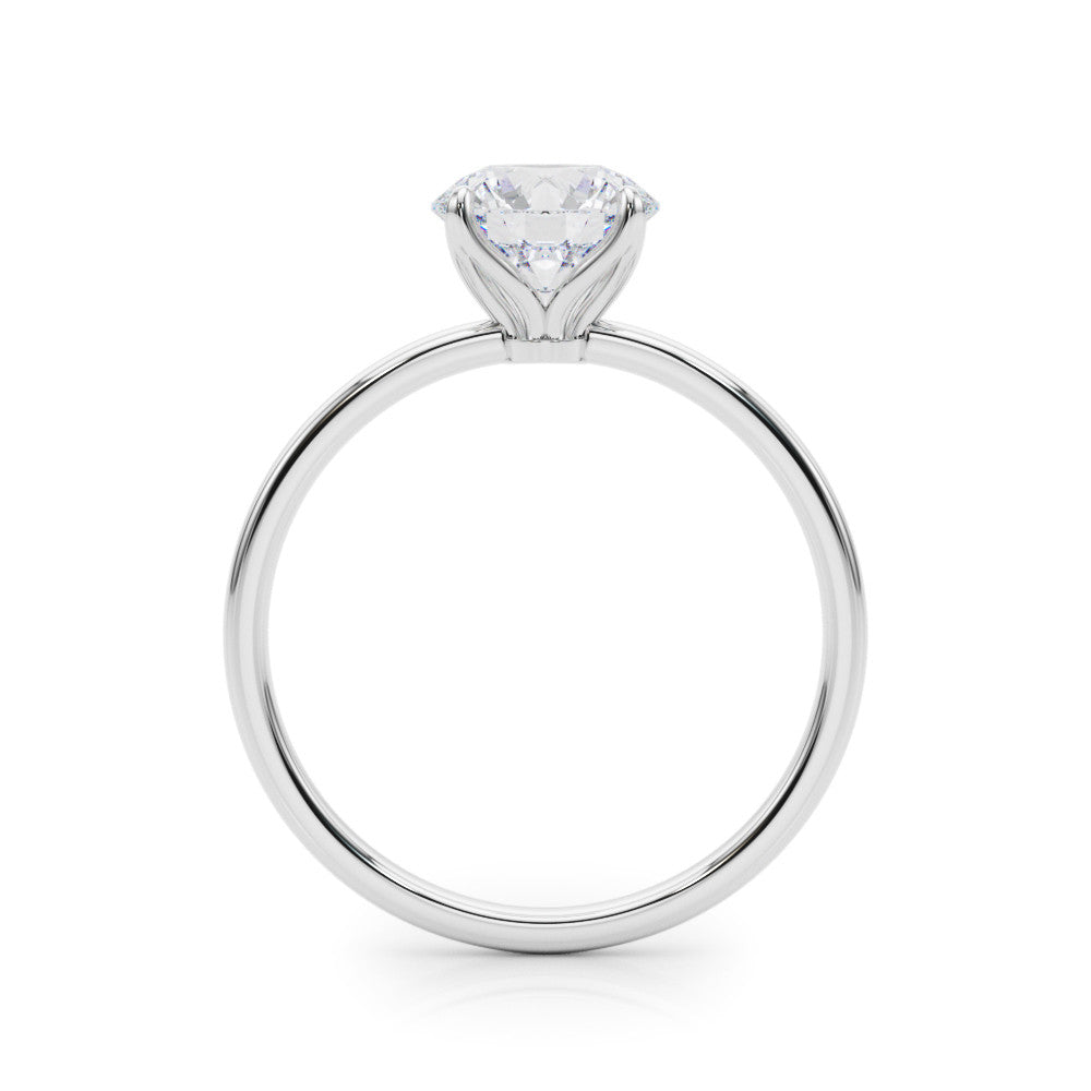 Silver Round Solitaire Diamond Ring with Thin Band and Four-Prong Setting 1