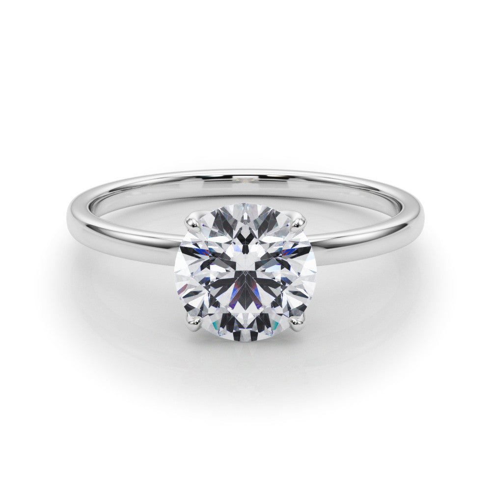Silver Round Solitaire Diamond Ring with Thin Band and Four-Prong Setting