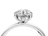 Silver Round Solitaire Diamond Ring with a Classic Band and Four-Prong Setting 4