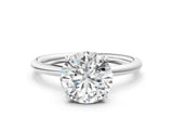 Silver Round Solitaire Diamond Ring with a Classic Band and Four-Prong Setting