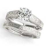 Silver Round Solitaire Diamond with Engraved Band and Four-Prong Setting