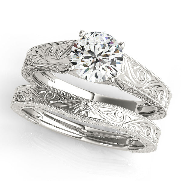 White gold Round Solitaire Diamond with Engraved Band and Four-Prong Setting