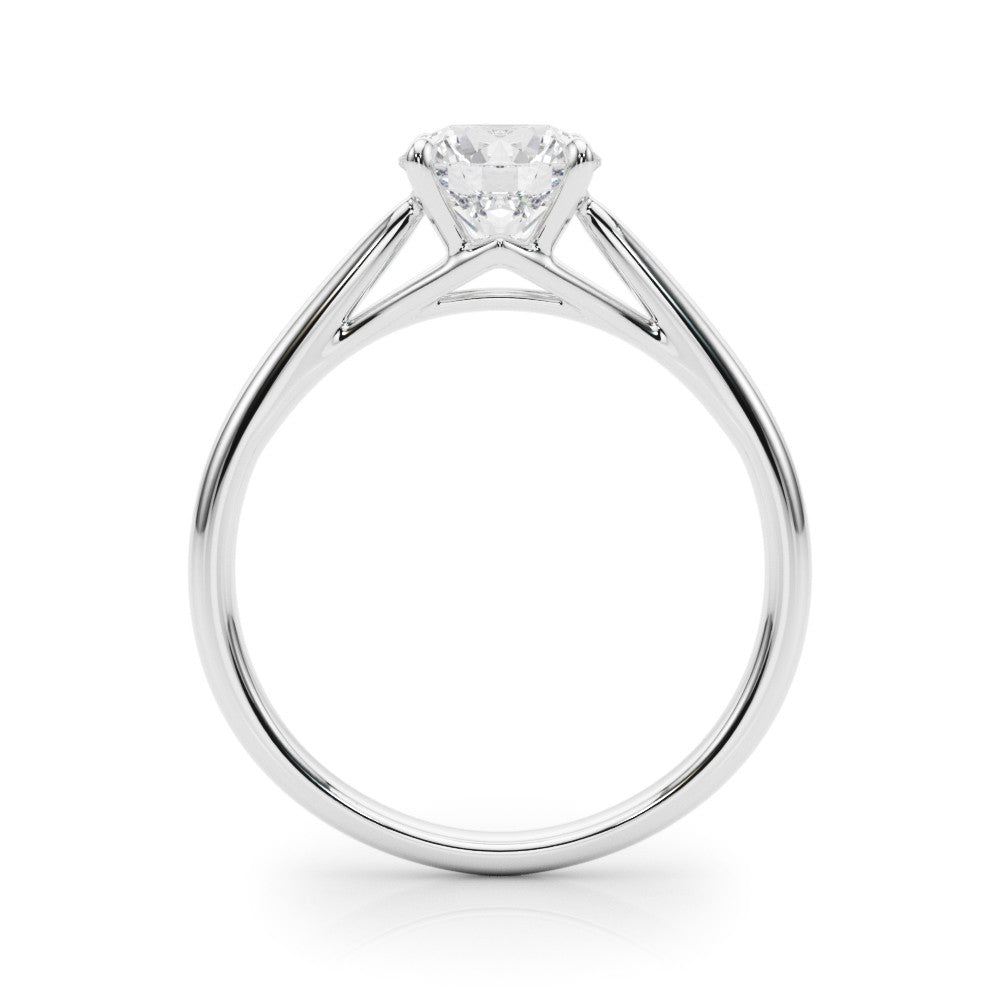 Silver Round Solitaire Engagement Ring with Four-Prong Setting and Classic Band 1
