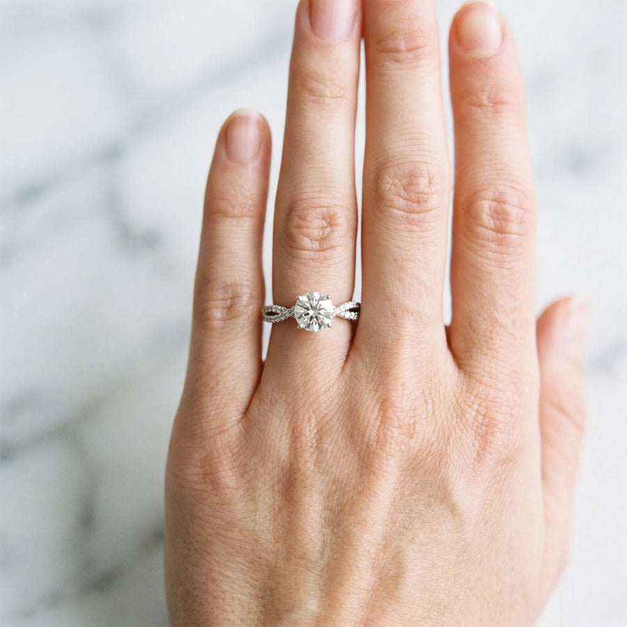 White gold Marquise Cut Solitaire Twist Pave Diamond Engagement Ring with Prong Setting