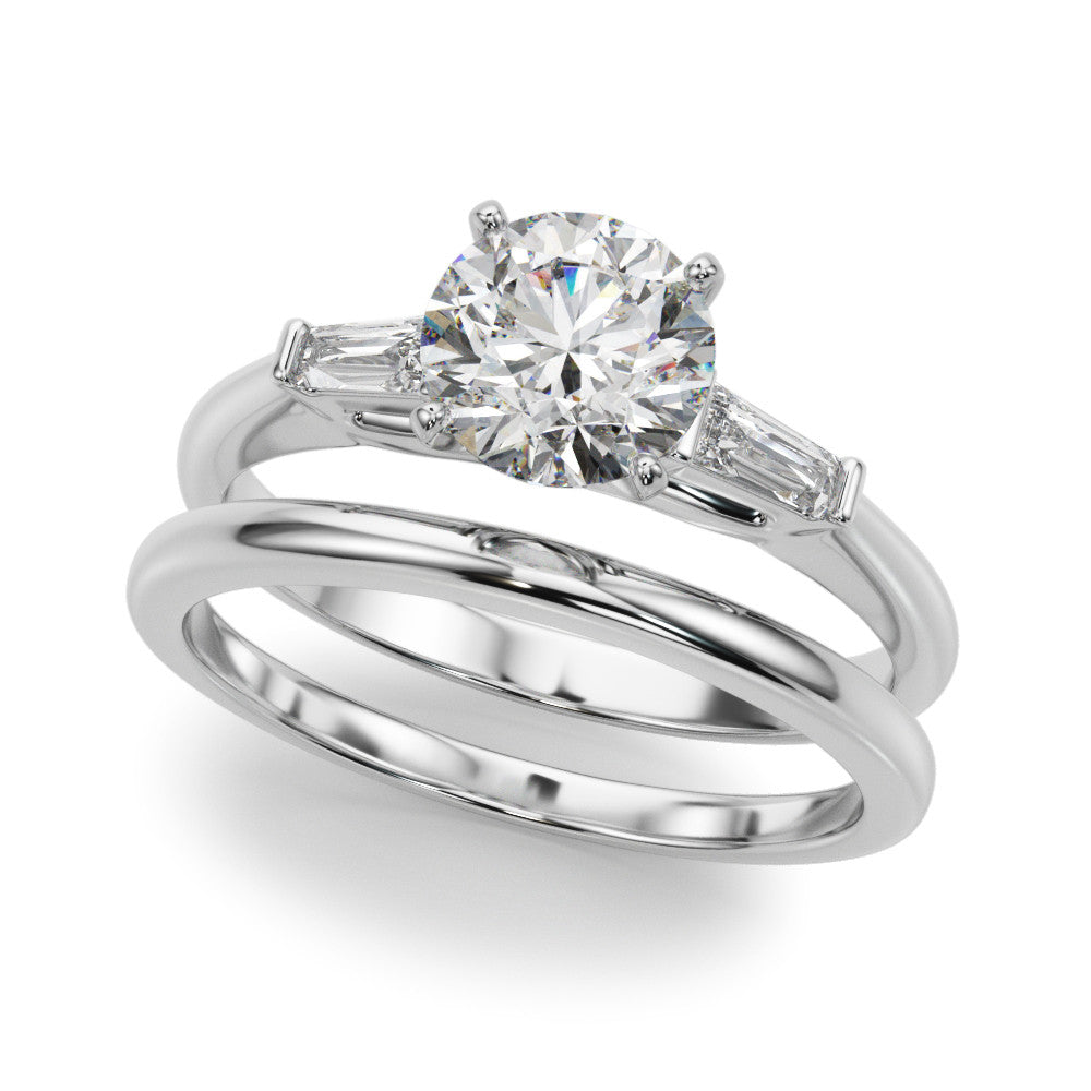 Silver Round Solitaire with Tapered Baguette Side Stones on a Classic Band with Four-Prong Setting