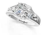 Silver Three-Stone Cushion Cut Cut Diamond Ring with Trillion Side Stones on a Split Shank Band_14