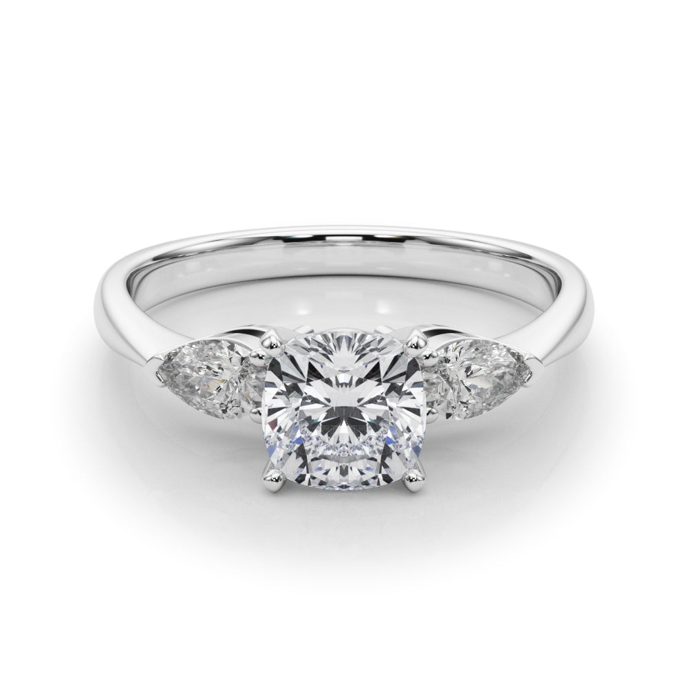 Silver Three-Stone Cushion Diamond Ring with Pear Side Stones on a Platinum Band with Four-Prong Setting