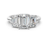 Silver Three-Stone Emerald Cut Diamond Engagement Ring with Prong Setting on a Silver Band_18