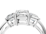 Silver Three-Stone Emerald Cut Diamond Engagement Ring with Prong Setting on a Silver Band_46