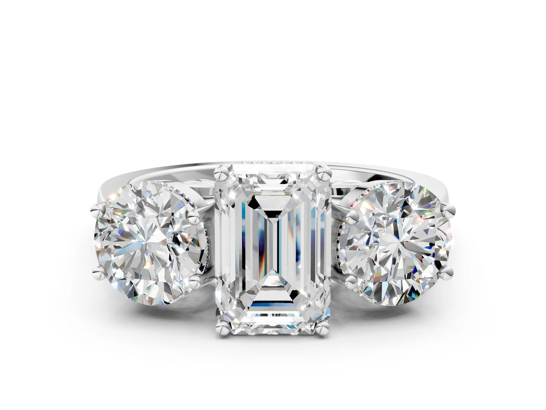 Silver Three-Stone Emerald Diamond Engagement Ring with Prong Setting on a Classic Band_3