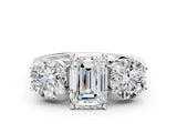 Silver Three-Stone Emerald Diamond Engagement Ring with Prong Setting on a Classic Band_3