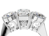 Silver Three-Stone Emerald Diamond Engagement Ring with Prong Setting on a Classic Band_7