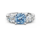 Silver Three-Stone Fancy Blue Cushion  Brilliant Cut Solitaire Ring with Prong Setting on a Classic Band