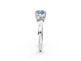 Silver Three-Stone Fancy Blue Cushion Cut Cut Diamond Ring with Channel Set Band and Four-Prong Setting_32