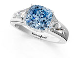 Silver Three-Stone Fancy Blue Cushion Cut Cut Diamond Ring with Trillion Side Stones on a Split Shank Band_31