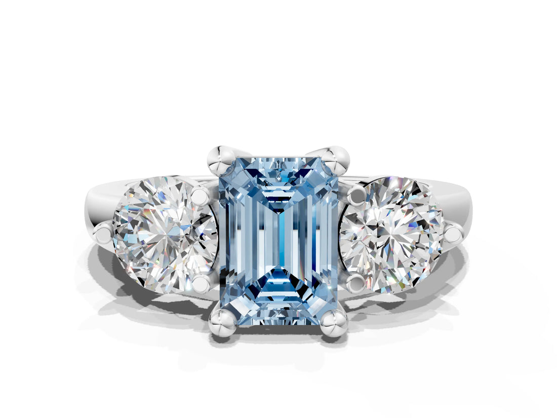 Silver Three-Stone Fancy Blue Emerald  Brilliant Cut Solitaire Ring with Prong Setting on a Classic Band 1
