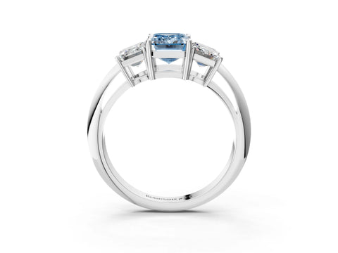 Silver Three-Stone Fancy Blue Emerald Cut Cut Diamond Engagement Ring with Prong Setting on a White Gold Band_45