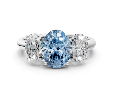 Silver Three-Stone Fancy Blue Oval Cut Cut Diamond Engagement Ring with Prong Setting on a White Gold Band_42