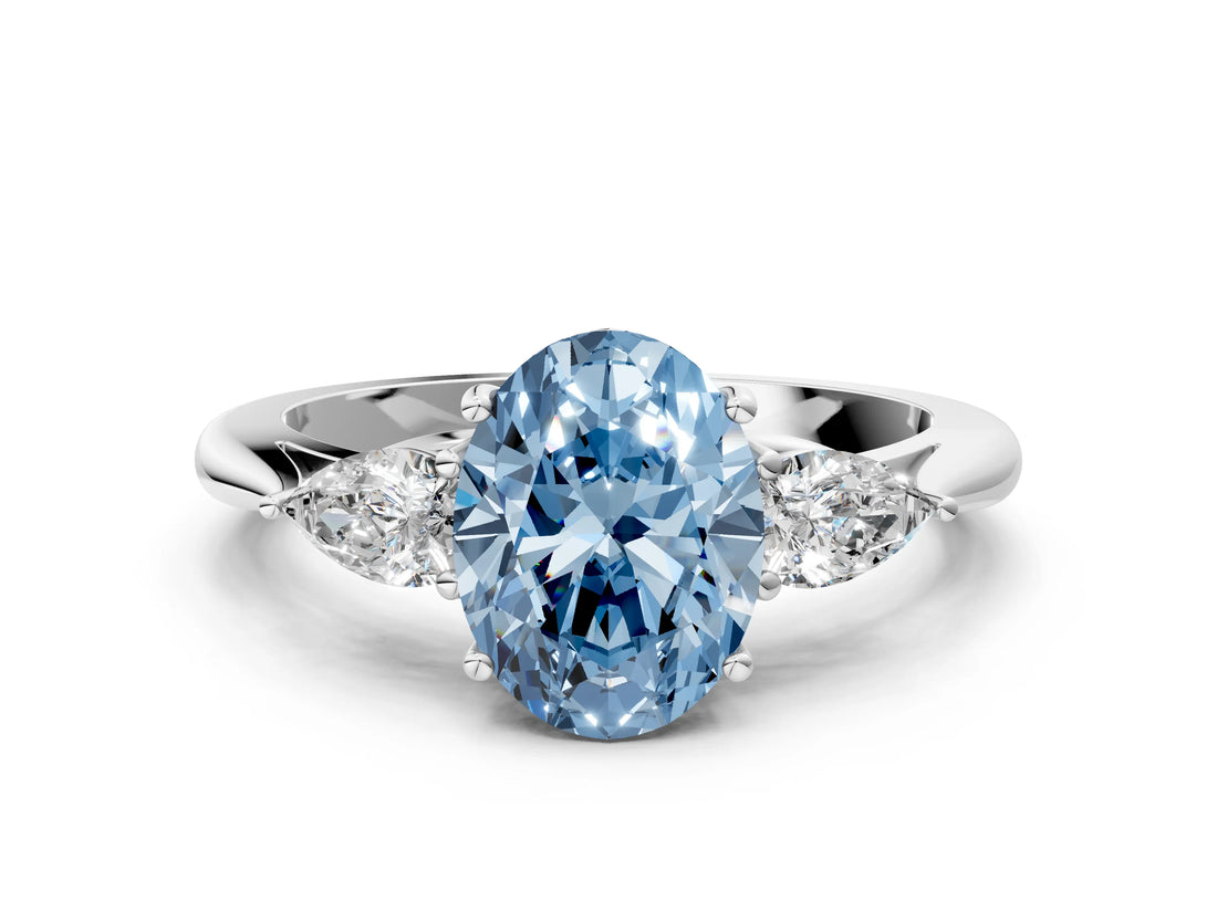 Silver Three-Stone Fancy Blue Oval Cut Diamond Ring with Pear  Side Stones in Four-Prong Setting_12