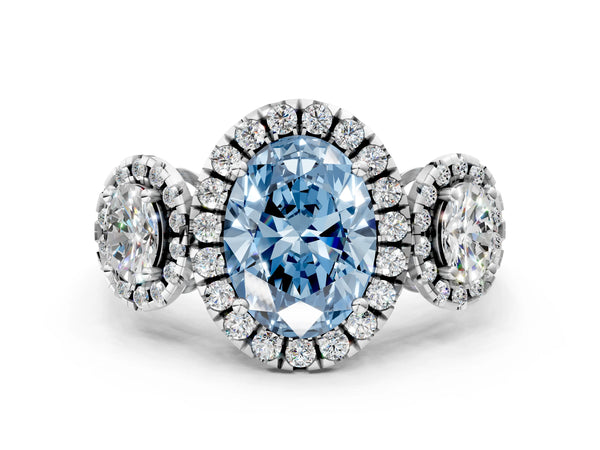 Silver Three-Stone Fancy Blue Oval Cut Halo Diamond Ring with Pave Band and Four-Prong Setting