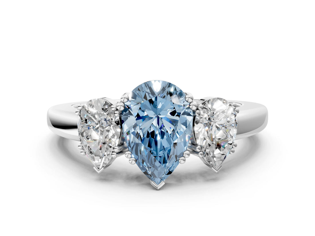 Silver Three-Stone Fancy Blue Pear Cut Cut Diamond Ring with Channel Set Band and Four-Prong Setting_18