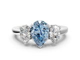 Silver Three-Stone Fancy Blue Pear Cut Cut Diamond Ring with Channel Set Band and Four-Prong Setting_18
