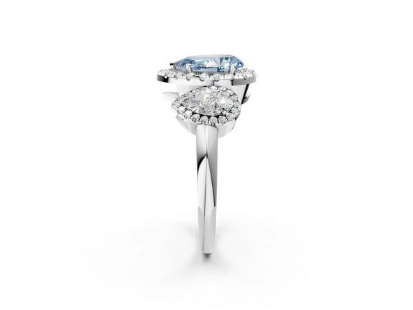 Silver Three-Stone Fancy Blue Pear Cut Halo Diamond Ring with Pave Band and Four-Prong Setting