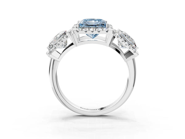 Silver Three-Stone Fancy Blue Princess Cut Halo Diamond Ring with Pave Band and Four-Prong Setting