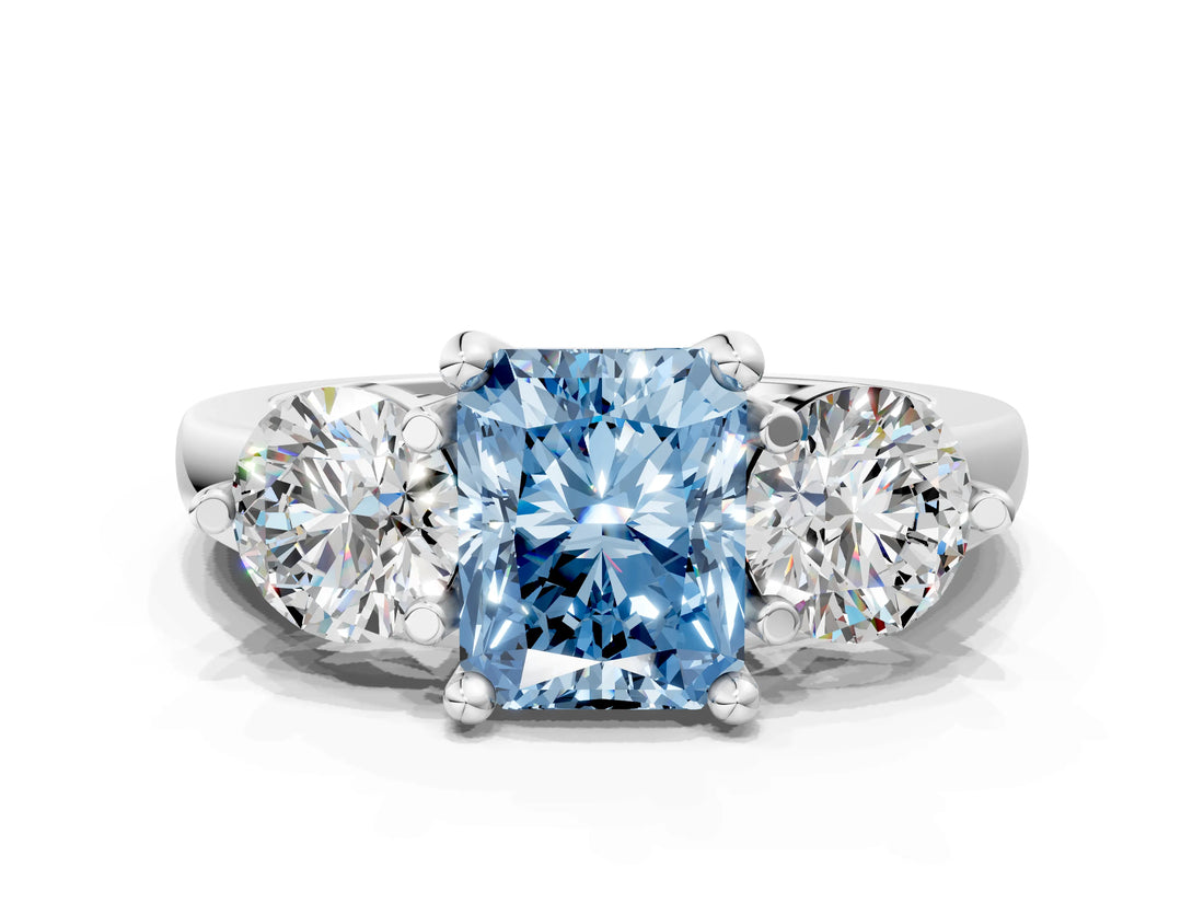 Silver Three-Stone Fancy Blue Radiant  Brilliant Cut Solitaire Ring with Prong Setting on a Classic Band