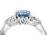 Silver Three-Stone Fancy Blue Radiant Cut Diamond Ring with Pear  Side Stones in Four-Prong Setting_16
